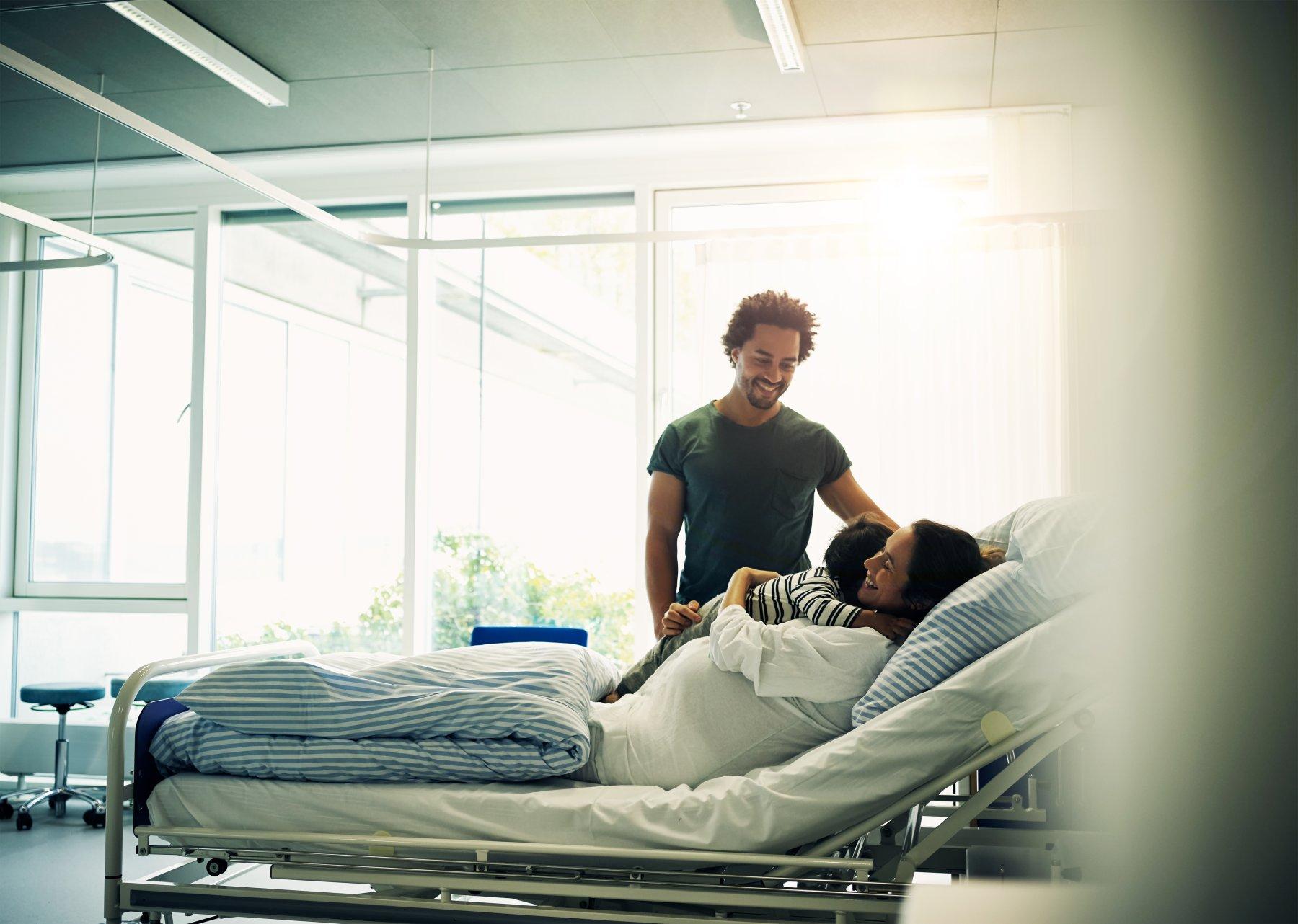 labor-and-delivery_mother-with-partner-and-child-in-hospital